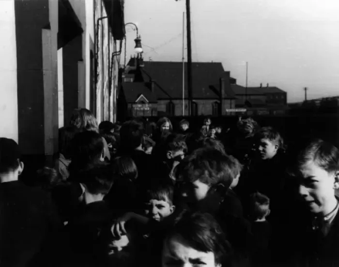 Framed Print : Children waiting outside cinema Framed Print : Children waiting outside cinema