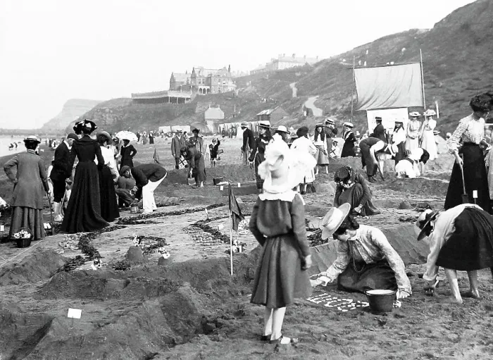 Framed Print : Children on Whitby Sands making a sand map of India Framed Print : Children on Whitby Sands making a sand map of India