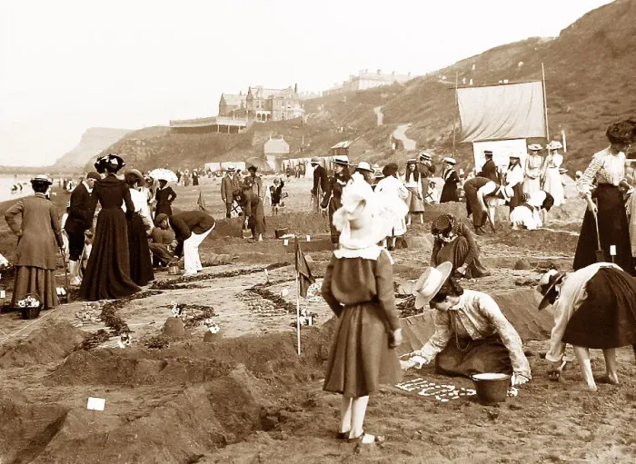 Framed Print : Children on Whitby Sands making a sand map of India Framed Print : Children on Whitby Sands making a sand map of India
