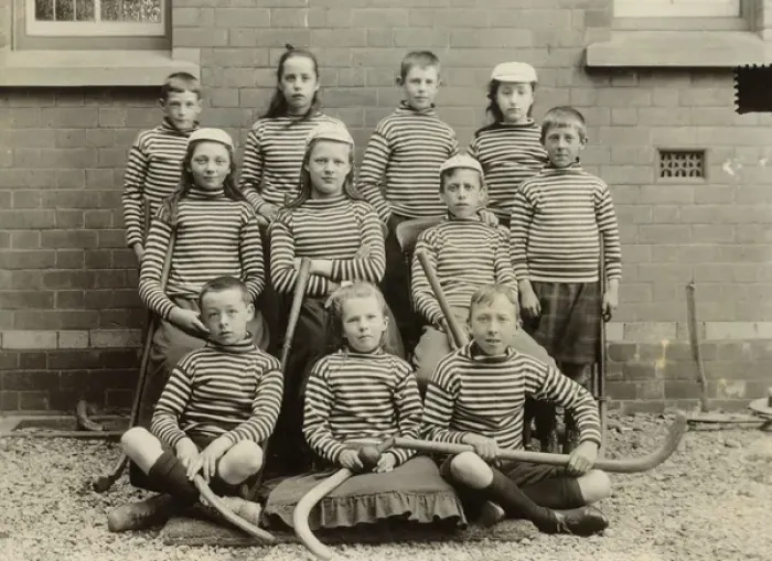 Framed Print : Childrens Mixed Hockey Team - London, late 19th century Framed Print : Childrens Mixed Hockey Team - London, late 19th century