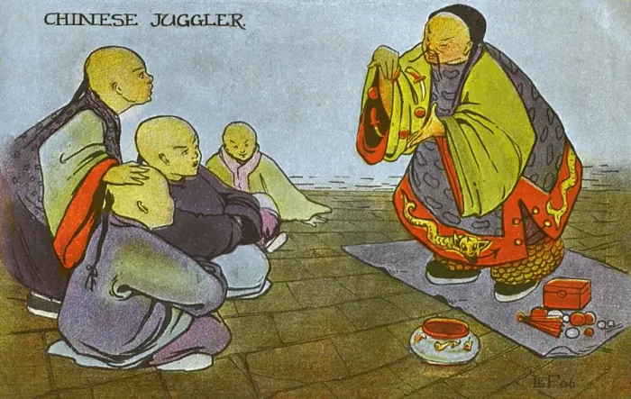 Framed Print : China - A Chinese Juggler amazes a group of young boys Framed Print : China - A Chinese Juggler amazes a group of young boys