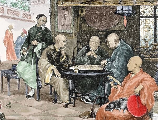 China. Men playing draughts in a tavern