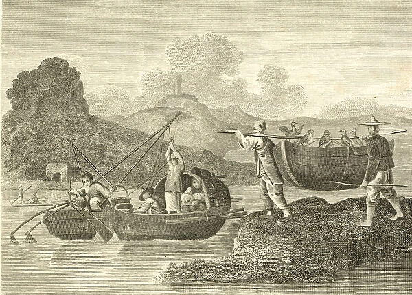 Chinese fishermen with boats and fighting birds
