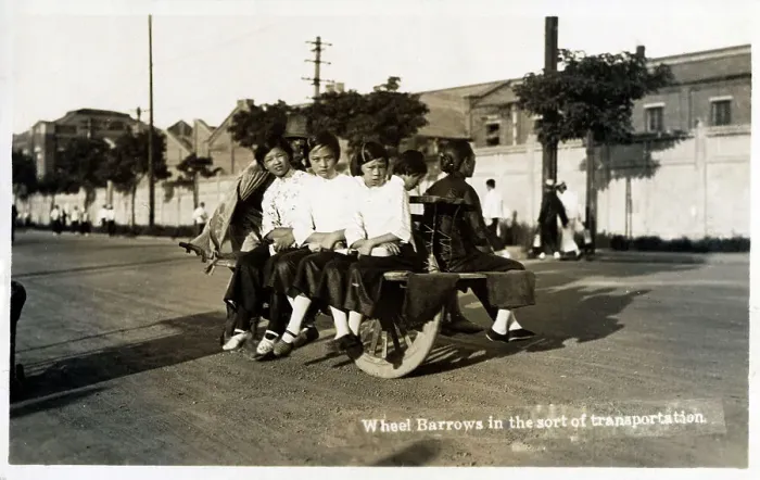 Framed Print : Chinese Schoolgirls transported on a wheelbarrow, China Framed Print : Chinese Schoolgirls transported on a wheelbarrow, China