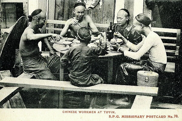 Chinese workmen at tiffin