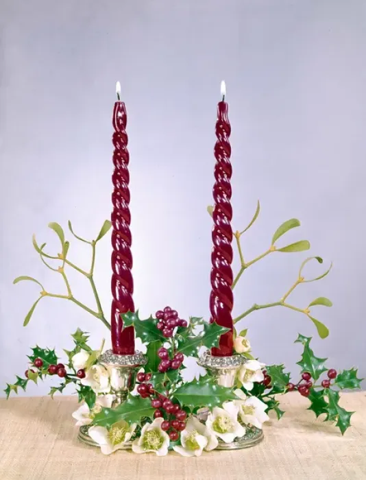 Framed Print : Christmas arrangement of candles, flowers and holly Framed Print : Christmas arrangement of candles, flowers and holly