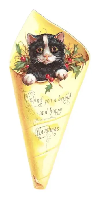 Framed Print : Christmas card in the shape of a kitten in wrapping paper Framed Print : Christmas card in the shape of a kitten in wrapping paper