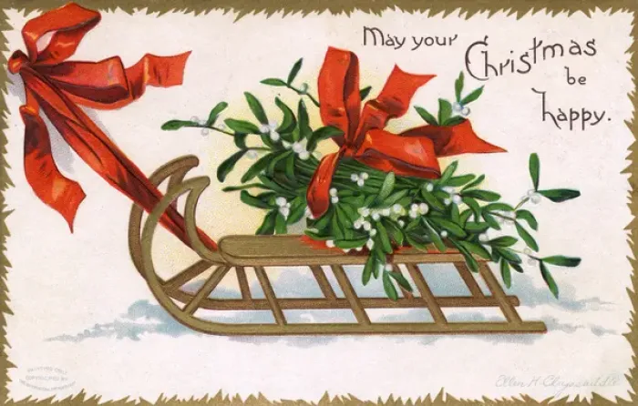 Framed Print : Christmas Mistletoe being pulled along atop a wooden frame Framed Print : Christmas Mistletoe being pulled along atop a wooden frame