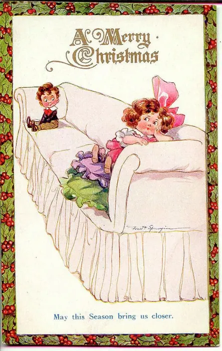 Framed Print : Christmas postcard, Little girl and boy on a long sofa - May this Season bring us closer Date: early 20th century
