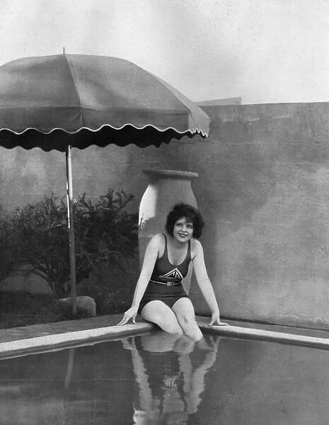 Clara Bow in her swimming pool, 1928