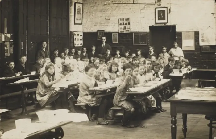 Framed Print : Classroom scene, with pupils eating at their desks Framed Print : Classroom scene, with pupils eating at their desks