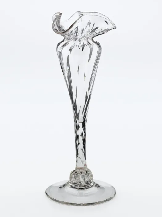 Framed Print : Vase. One of two clear glass vases with a spreading foot Framed Print : Vase. One of two clear glass vases with a spreading foot
