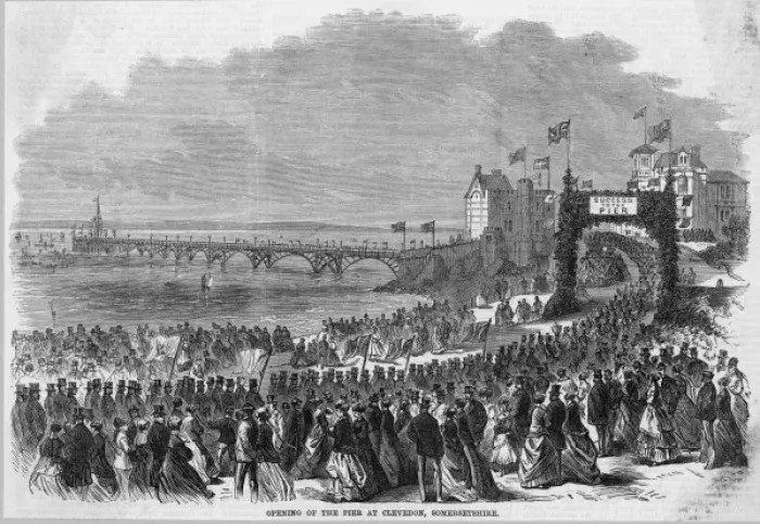Framed Print : CLEVEDON. What is a seaside resort without a pier ? Crowds gather for the Framed Print : CLEVEDON. What is a seaside resort without a pier ? Crowds gather for the