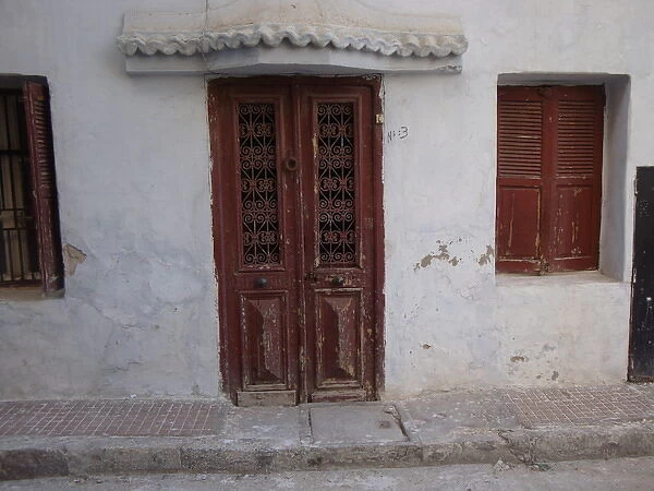 Close up of rustic door and window in Rabat