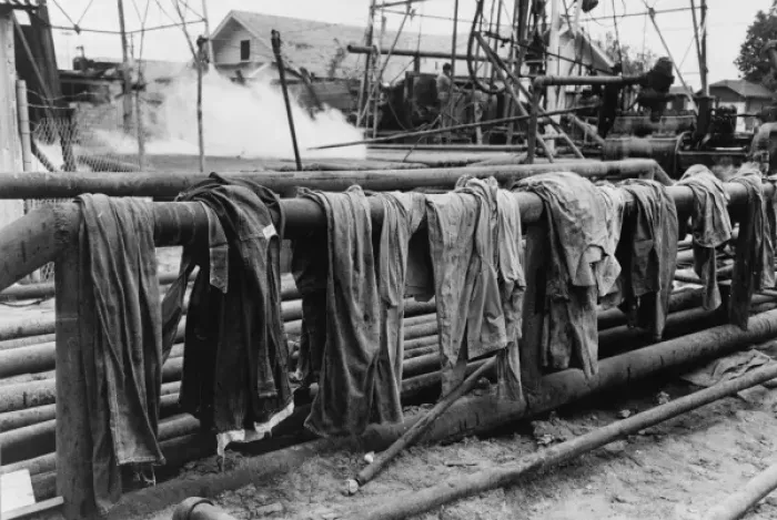 Framed Print : Clothing of oil drilling workers drying on steam pipe, Kilgo Framed Print : Clothing of oil drilling workers drying on steam pipe, Kilgo
