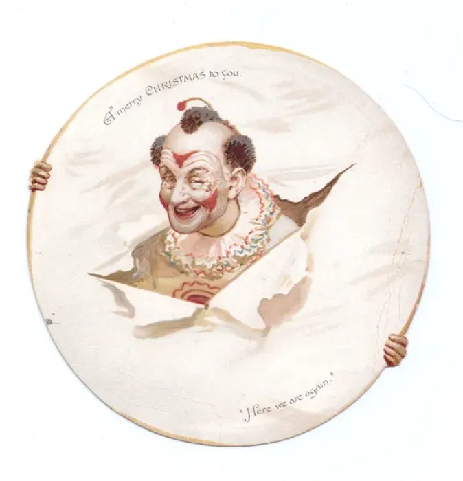 Framed Print : Clown with head through paper on a Christmas card Framed Print : Clown with head through paper on a Christmas card