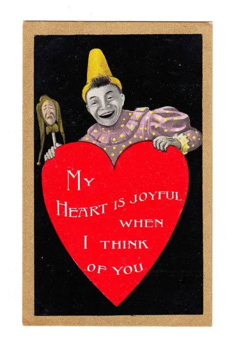 Framed Print : Clown with red heart on a Valentine postcard Framed Print : Clown with red heart on a Valentine postcard