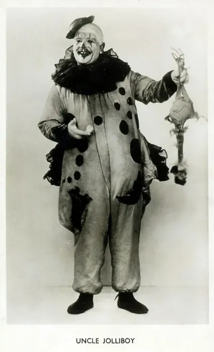 Framed Print : Clown Uncle Jolliboy - holding up a fake chicken Framed Print : Clown Uncle Jolliboy - holding up a fake chicken