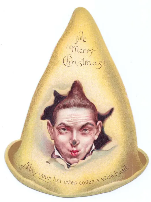 Framed Print : Clowns face on a hat-shaped Christmas card Framed Print : Clowns face on a hat-shaped Christmas card