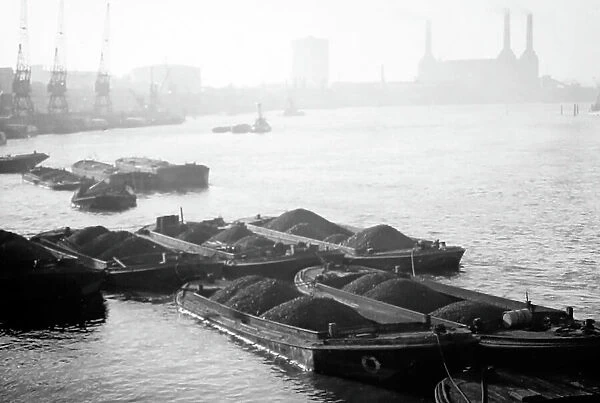 Coal barges on the Thames, London, early 1900s