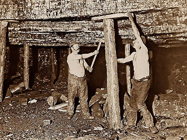 Coal Mining fitting roof supports early 1900s