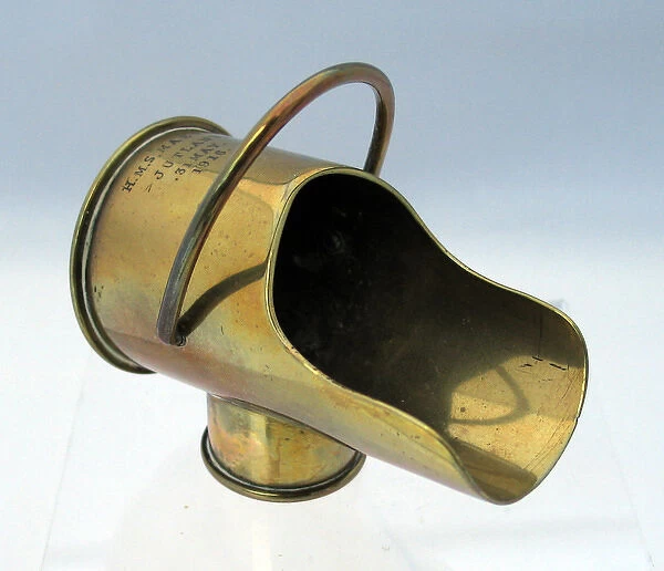 A coal-scuttle made from two types of shell cases
