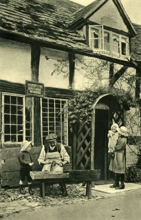 Framed Print : Cobbler at work outside his cottage, Wigmore, Herefordshire Framed Print : Cobbler at work outside his cottage, Wigmore, Herefordshire