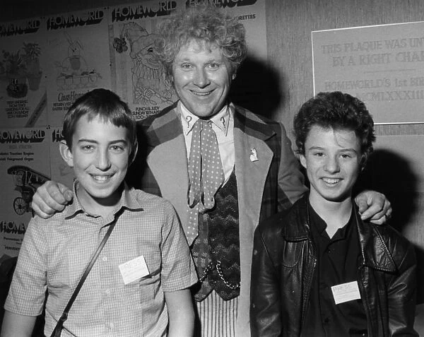 Colin Baker as Dr Who, with two young fans