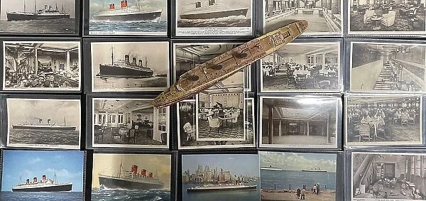 Collection of ocean liner postcards, and Queen Mary model