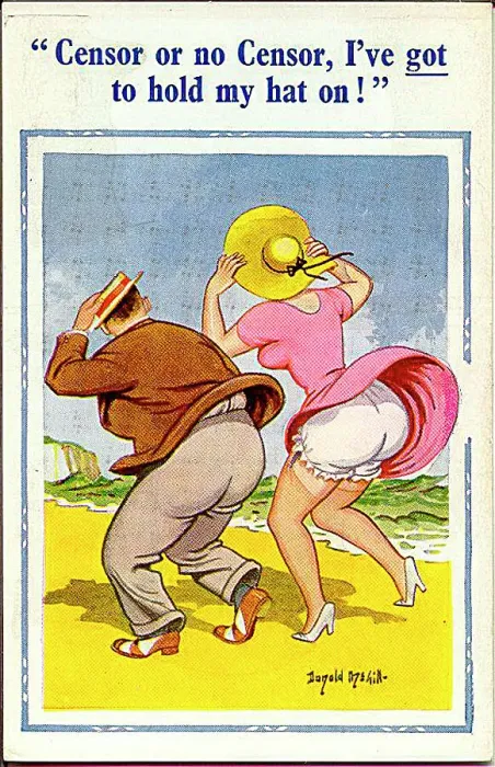 : Comic postcard, Couple at the seaside on a windy day : Comic postcard, Couple at the seaside on a windy day