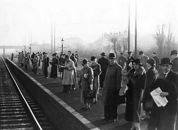 Commuters Await Train