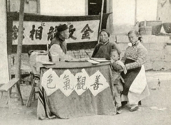 Consulting the street fortune teller, China, East Asia