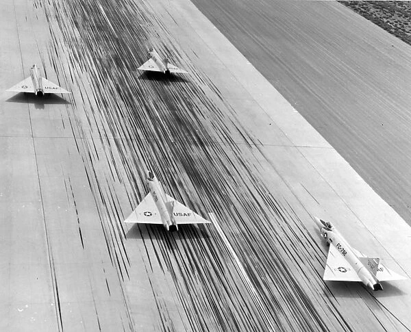 Four Convair F-102A Delta Daggers on the runway at Palmdale