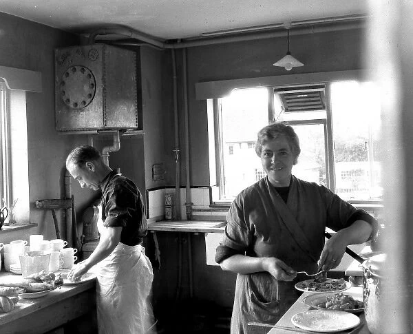 Cooks in the kitchen at Bromley fire station, WW2