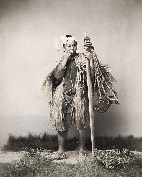 Coolie, farm worker, labourer, smoking a pipe, Japan
