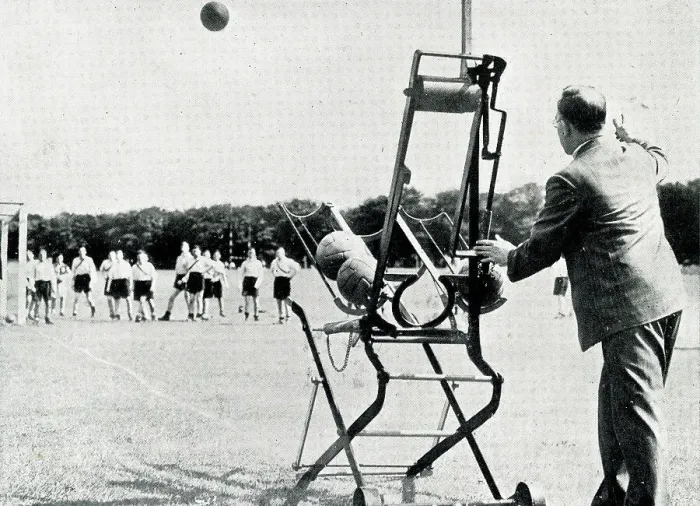Framed Print : Corner kick from goal shooting machine Framed Print : Corner kick from goal shooting machine