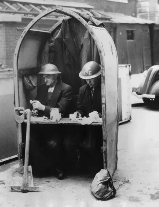 Framed Print : A Cosy Diner - Workmen have lunch amid the air raids Framed Print : A Cosy Diner - Workmen have lunch amid the air raids