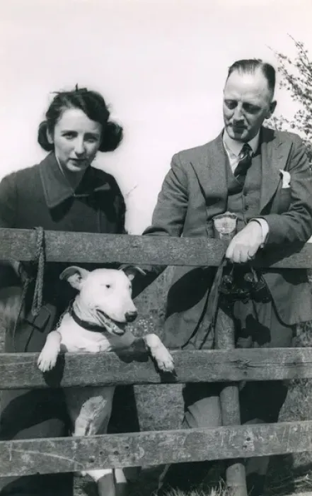 Framed Print : Couple with a bull terrier Framed Print : Couple with a bull terrier