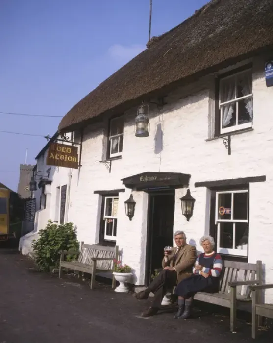 Framed Print : Couple outside Old Albion Inn, Crantock, Cornwall Framed Print : Couple outside Old Albion Inn, Crantock, Cornwall