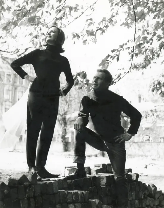Framed Print : A couple pose on a pile of bricks. The woman holds a rather large hanky. Date: late 1960s Framed Print : A couple pose on a pile of bricks. The woman holds a rather large hanky. Date: late 1960s
