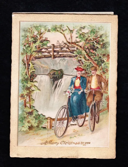 Framed Print : Couple riding bicycles on a Christmas card Framed Print : Couple riding bicycles on a Christmas card