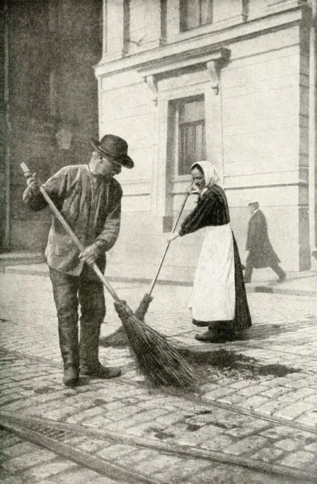 Framed Print : Couple sweeping a street, Helsingfors, Finland Framed Print : Couple sweeping a street, Helsingfors, Finland