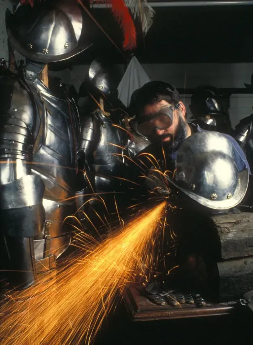 Framed Print : Craftsman puts finishing touches to replica suit of armour Framed Print : Craftsman puts finishing touches to replica suit of armour