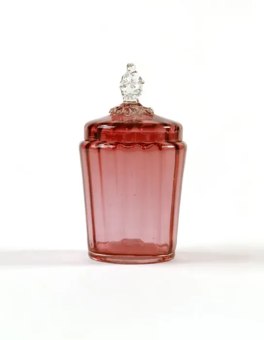 Framed Print : Jar. Cranberry-coloured glass jar with a ribbed interior Framed Print : Jar. Cranberry-coloured glass jar with a ribbed interior
