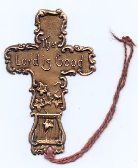 Framed Print : Cross-shaped metal bookmark Framed Print : Cross-shaped metal bookmark