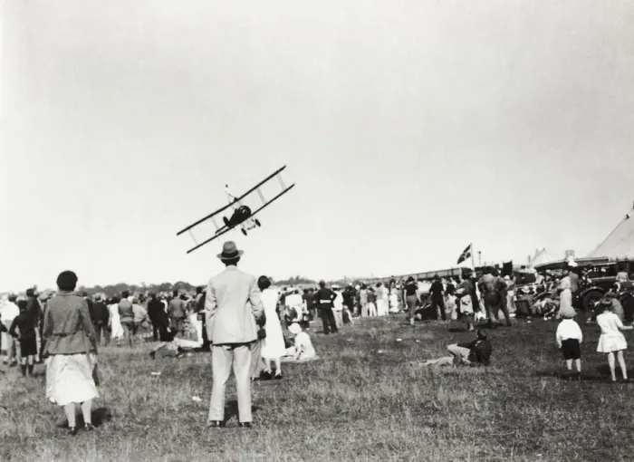 Framed Print : A Crowd of People Watching a Biplane Aircraft Flypast wi? Framed Print : A Crowd of People Watching a Biplane Aircraft Flypast wi?
