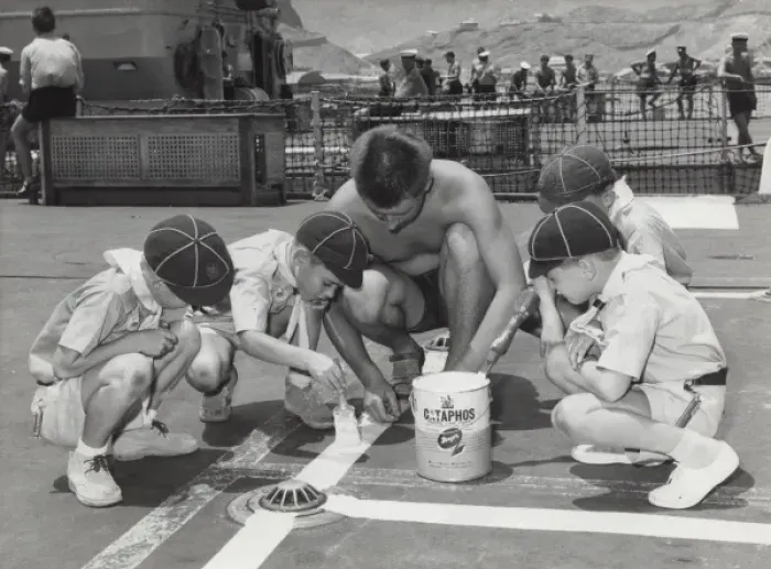 Framed Print : Cubs painting lines on ship Framed Print : Cubs painting lines on ship
