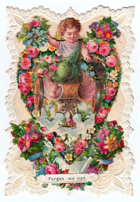 Framed Print : Cupid in a chariot with flowers on a Valentine card Framed Print : Cupid in a chariot with flowers on a Valentine card