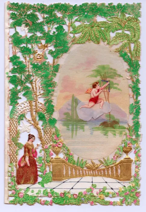 Framed Print : Cupid and lady with flowers on a paper lace romantic card Framed Print : Cupid and lady with flowers on a paper lace romantic card