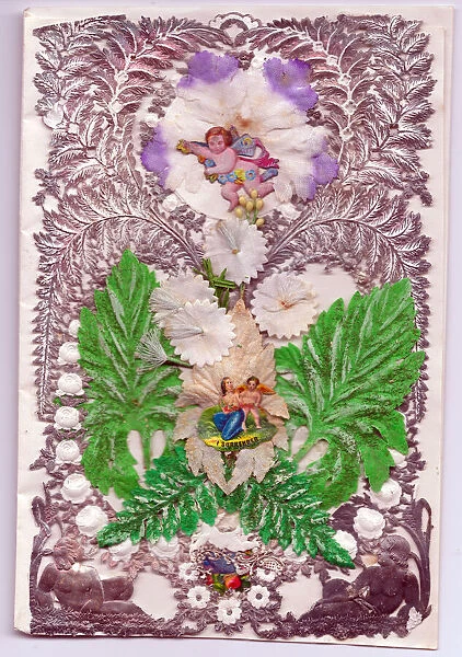 Cupid with leaves on a paper lace romantic card